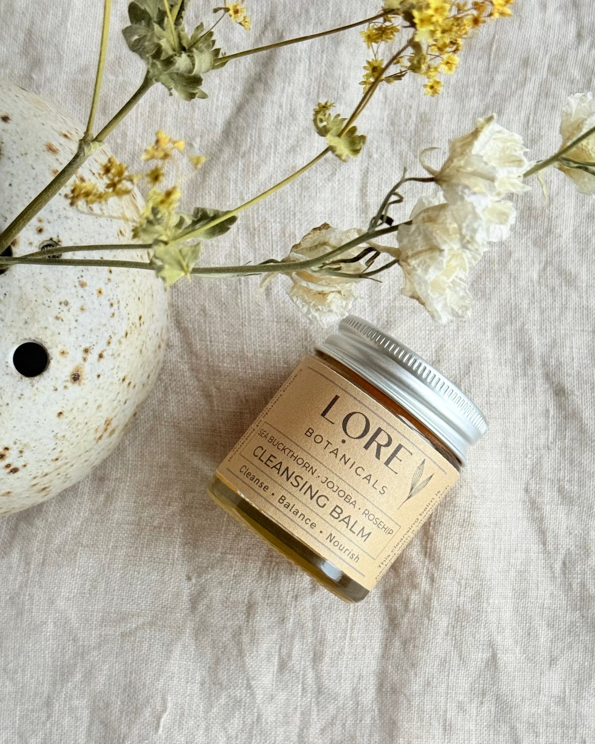 Packed with skin loving oils and butters this clever cleanser will gently draw out dirt and toxins from pores, melting away makeup and impurities. This caring blend will help smooth, nourish and hydrate skin needing that little bit extra, rebalancing sebum levels and reducing the appearance of fine lines.

Scented with a heavenly trio of geranium, lavender & grapefruit essential oils to transport you to your happy place day after day.
