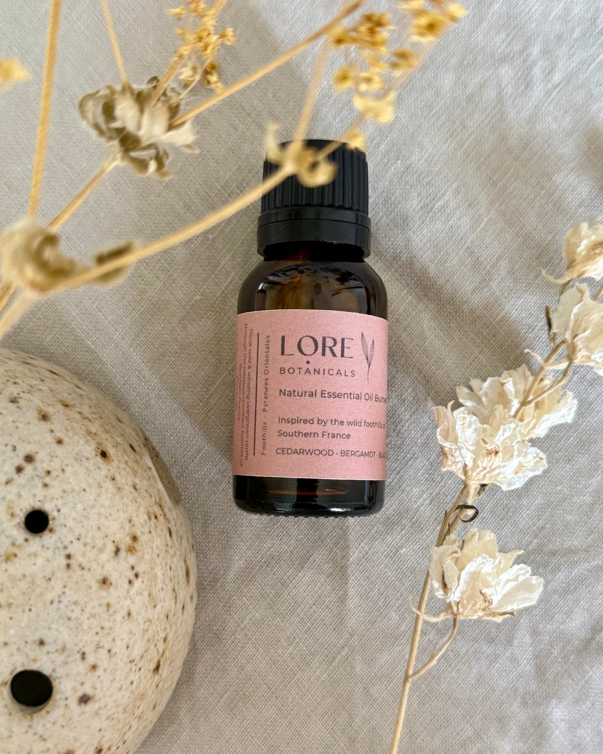 Inspired by the wild foothills of southern Europe, this essential oil blend has been lovingly formulated to transport the senses to the Pyrenees Orientales in  France with its abundant & untamed flora & fauna. 

Think wild & winding overgrown paths through the resinous aromatic foothills of southern France. 

Main scent profile:  Cedearwood / Bergamot / Blackpepper - Resinous - Spicey - Woody
