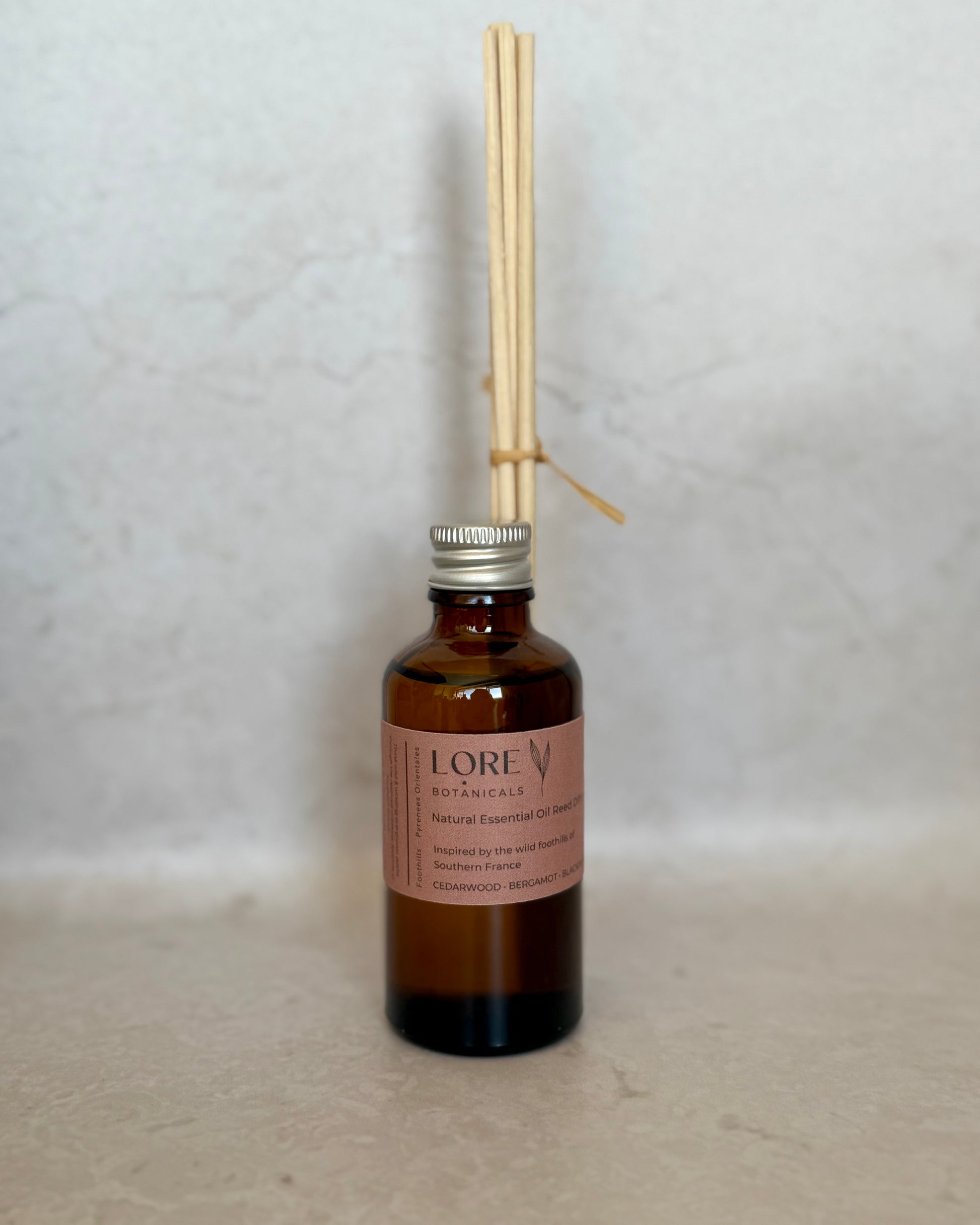 Inspired by the wild foothills of southern Europe, this essential oil reed diffuser blend has been lovingly formulated to transport the senses to the Pyrenees Orientales in  France with its abundant & untamed flora & fauna. 

Think wild & winding overgrown paths through the resinous aromatic foothills of southern France. 

Main scent profile:  Cedearwood / Bergamot / Blackpepper - Resinous - Spicey - Woody
