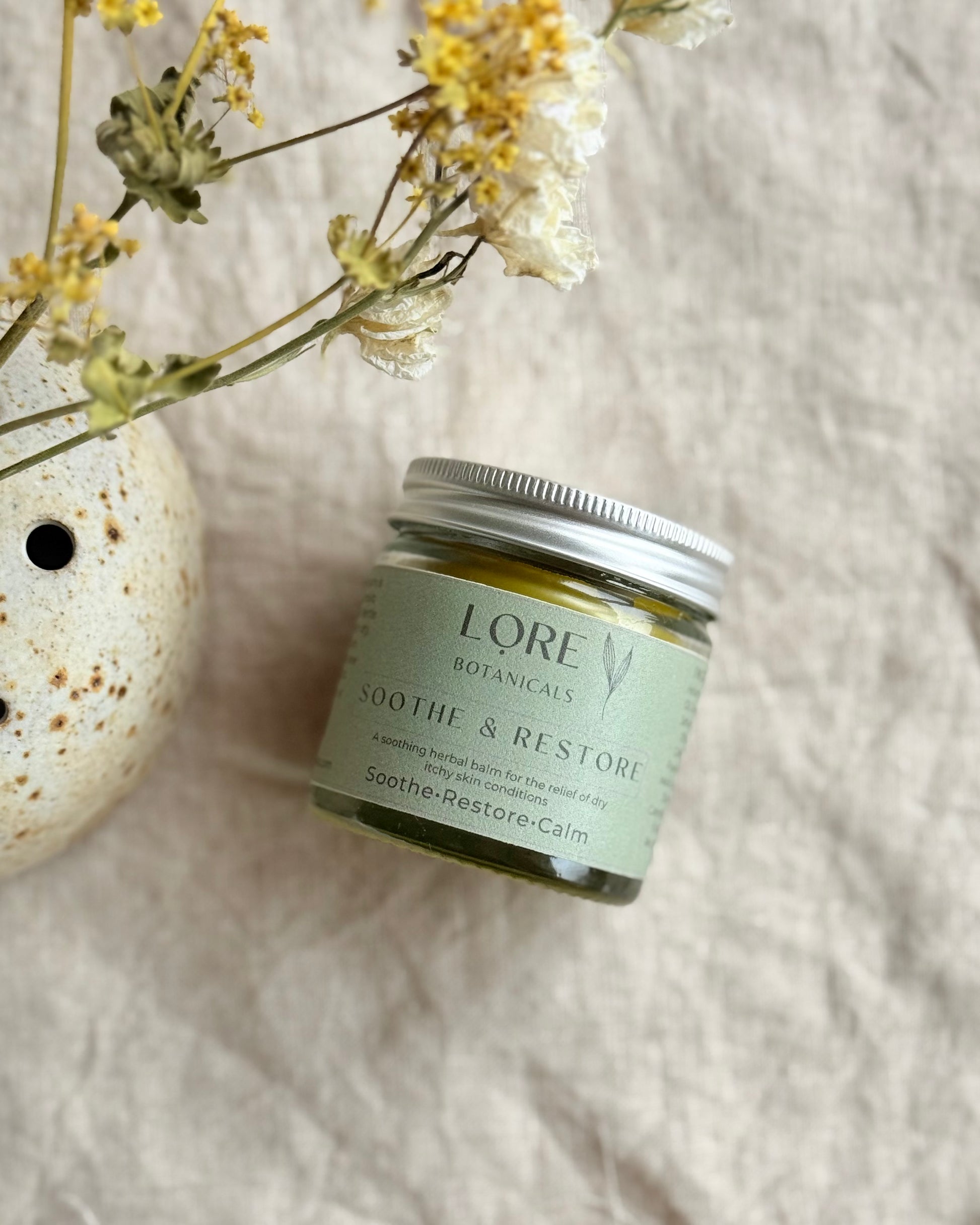 Soothe & Restore is a herbal infused balm for the relief of dry itchy skin conditions such as eczema and psoriasis.

This balm is packed with herbs renowned for their ability to aid skin health, reduce inflammation and relieve dry sore skin. 